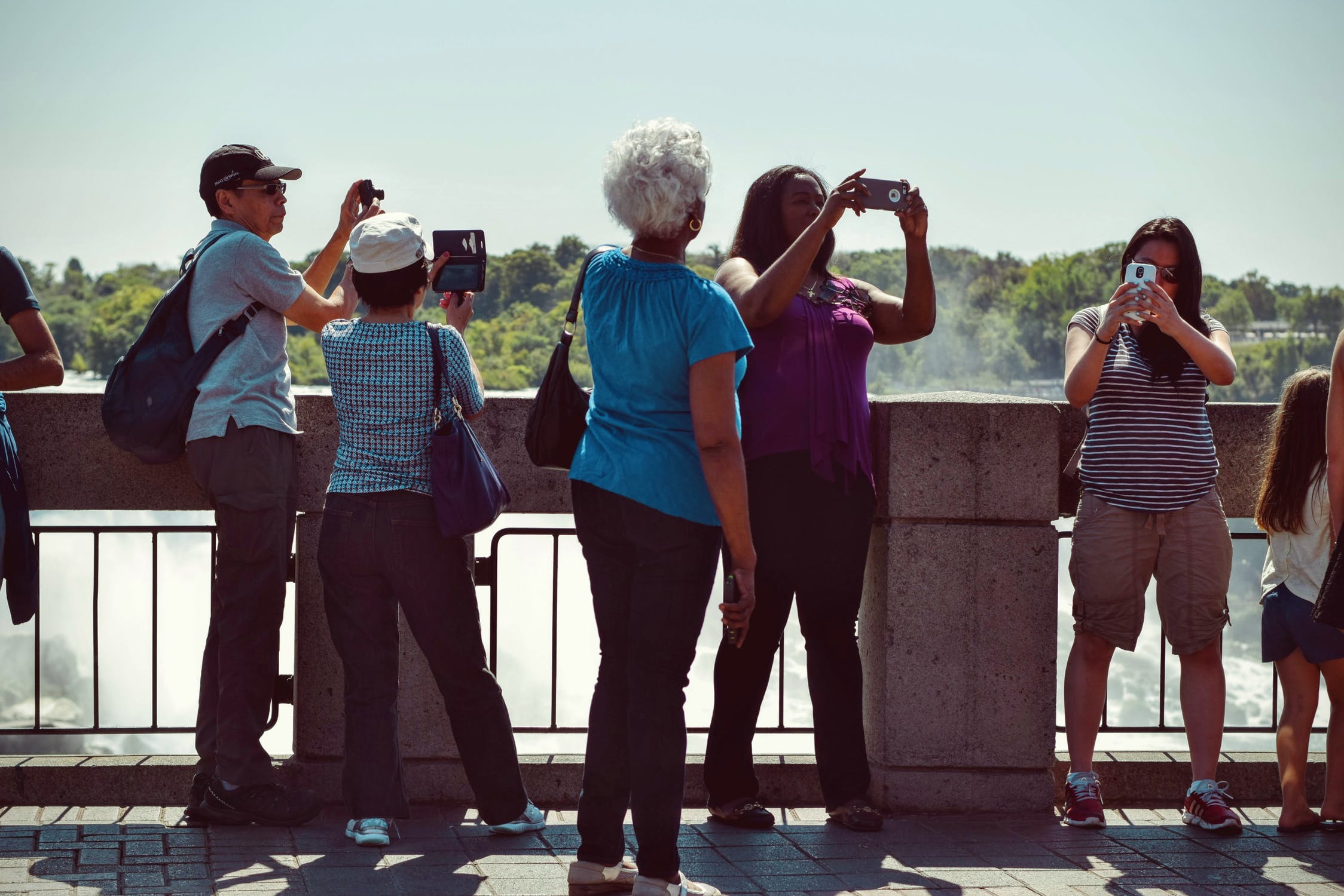 Group of tourists taking pictures